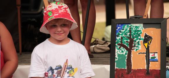kid with painting